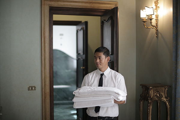 Bellman with towels at a local Phoenix Hotel