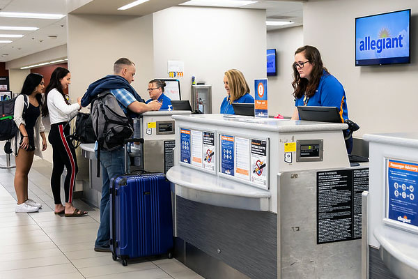 Passenger with luggage at Phoenix-Mesa Gateway Airport