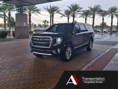 SUV Fleet - GMC Yukon in front of Hotel